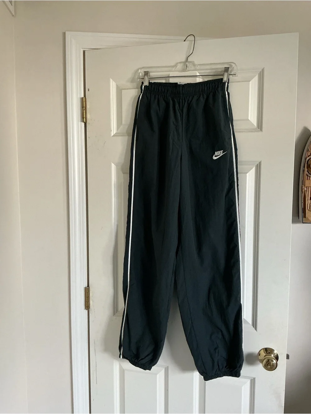 Nike women’s black track pants athletic windbreaker white stripe XS